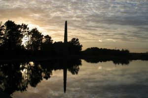 Pumphouse and reflection in Water